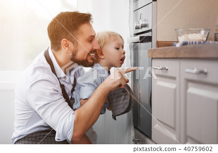 father with   child   son prepares meal,  40759602