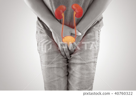 Man with hands holding her crotch 40760322