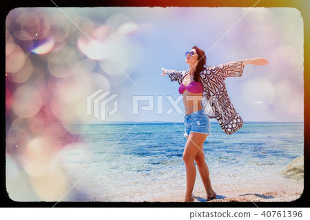 Young beautiful girl in bikini on the beach Young beautiful girl in bikini on the beach 40761396