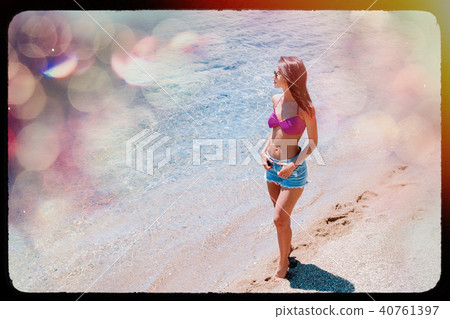 Young beautiful girl in bikini on the beach 40761397