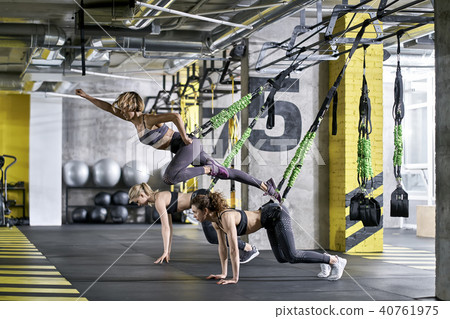 Sportive girls training in gym 40761975