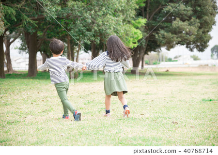 A child walking hand in hand 40768714