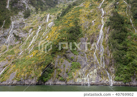 Water fall on High mountain at Milford Sound. Water fall on High mountain at Milford Sound. 40769902