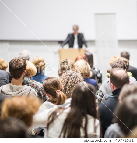 Business speaker giving a talk at business conference event. Business speaker giving a talk at business conference event. 40771531