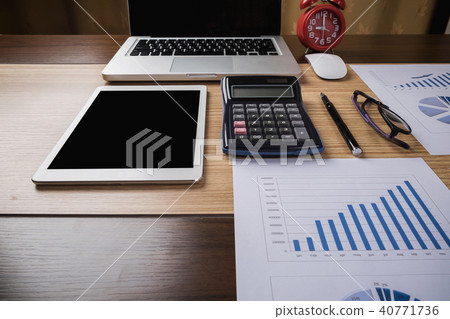 Desk office with laptop,pen,report and calculator Desk office with laptop,pen,report and calculator 40771736