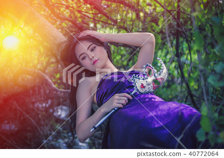 portrait of asia women with mask on nature 40772064