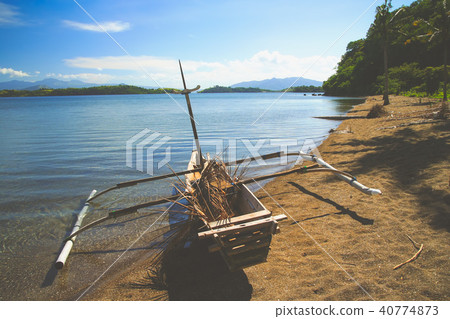 Wooden fishing pirogue on the beach in  Sumbava 40774873