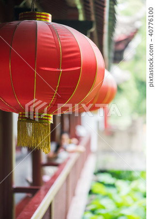 Red chinese lanterns hanging on a bridge Red chinese lanterns hanging on a bridge 40776100