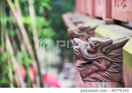 row of red dragon heads in a chinese taoist temple row of red dragon heads in a chinese taoist temple 40776103