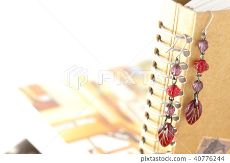 Piercing hanging in notepad 40776244