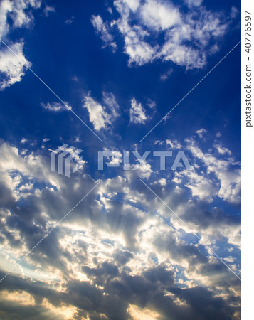 Fluffy clouds in the blue sky 40776597