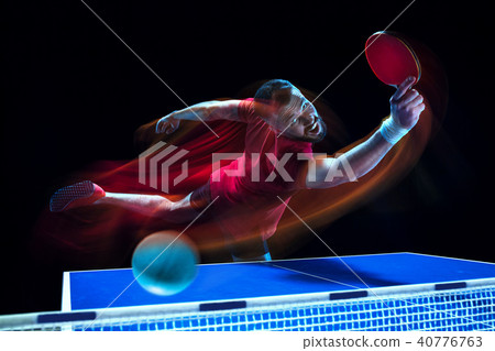 The table tennis player serving The table tennis player serving 40776763