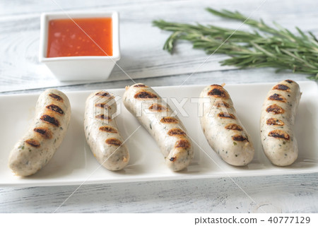 Grilled sausages with sweet chili sauce Grilled sausages with sweet chili sauce 40777129