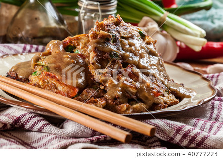 Chinese egg fu yung omelette 40777223
