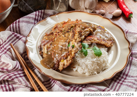 Close-up of piece egg foo young 40777224