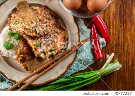 Close-up of piece egg foo young Close-up of piece egg foo young 40777227