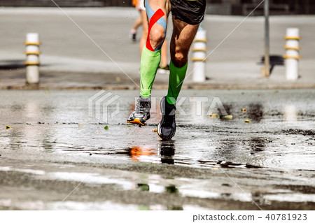 legs runner man with kinesio tape legs runner man with kinesio tape 40781923