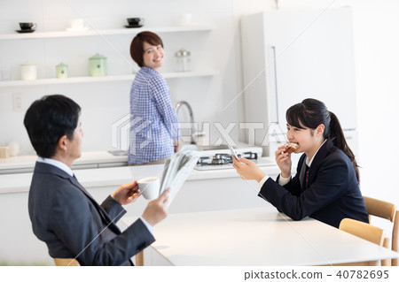 School girl who hurries to eat breakfast School girl who hurries to eat breakfast 40782695