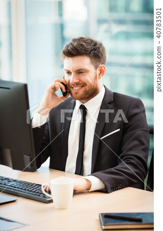 Young businessman in office Young businessman in office 40783501