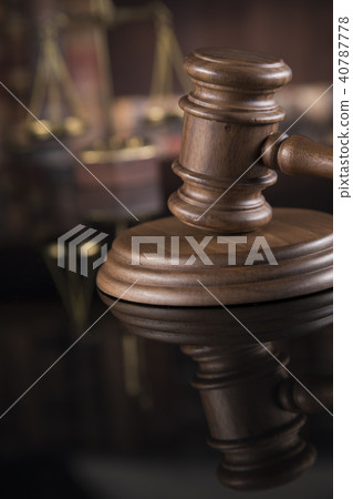 Judges wooden gavel, on mirror reflection Judges wooden gavel, on mirror reflection 40787778