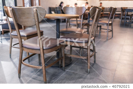 interior of coffee shop with wooden furniture 40792021