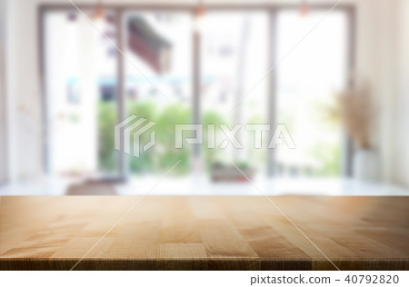 Selected focus empty brown wooden table and Coffee shop blur bac Selected focus empty brown wooden table and Coffee shop blur bac 40792820