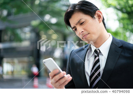 Businessman suffers Businessman suffers 40794098