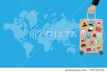 Travel bag in hand. Trolley on wheels 40794310