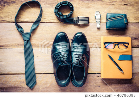 Leather shoes and accessories  work on the wooden  40796393