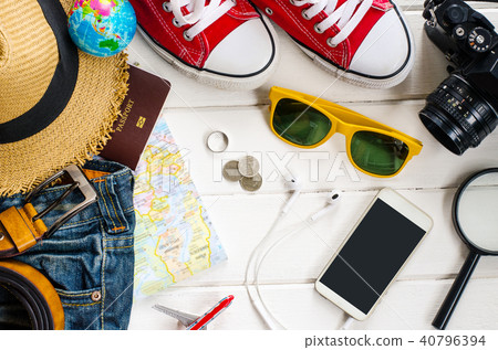 Travel accessories and costume on white background 40796394