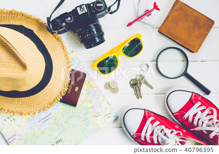 Travel accessories and costume on white background Travel accessories and costume on white background 40796395