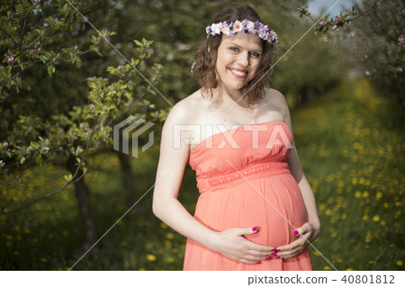 Spring, Young beautiful pregnant woman 40801812