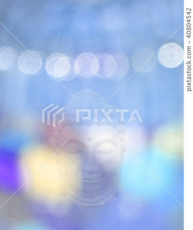 Buddha head and blue blurry light 40804542