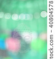 Buddha head and green blurry light 40804578