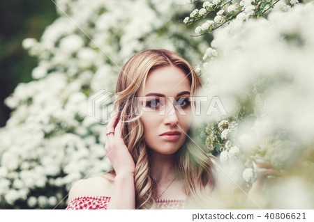 woman in blossom park woman in blossom park 40806621