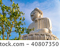 Low angle view of white marble big Buddha statue 40807350