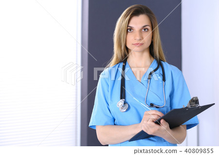 Woman doctor at work in hospital office. Portrait of female physician. Medicine and health care 40809855