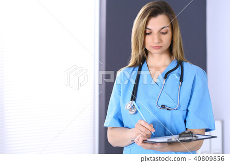 Woman doctor at work in hospital office. Portrait of female physician. Medicine and health care 40809856