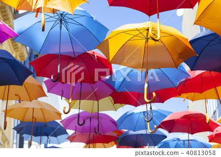 Colorful umbrellas hanging in the air 40813058