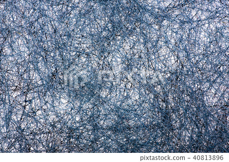 Abstract of a plurality of intertwined threads 40813896