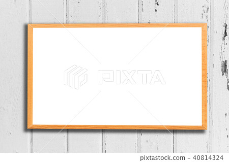 Mock up blank wooden picture frame on wooden wall Mock up blank wooden picture frame on wooden wall 40814324