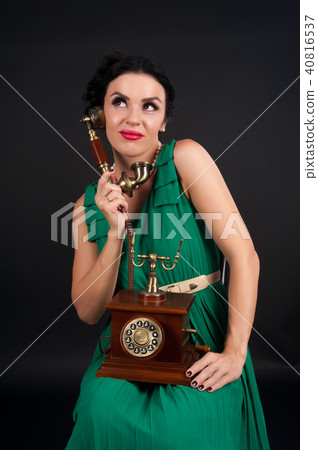 Pretty woman with retro phone Pretty woman with retro phone 40816537