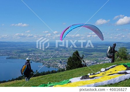 Paraglider over the Zug city, Zugersee and Swiss Alps, Switzerland 40816827