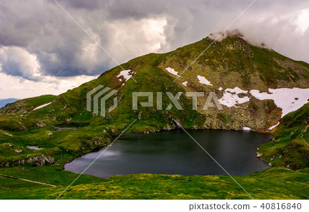 glacier lake Capra at the foot of the mountain 40816840