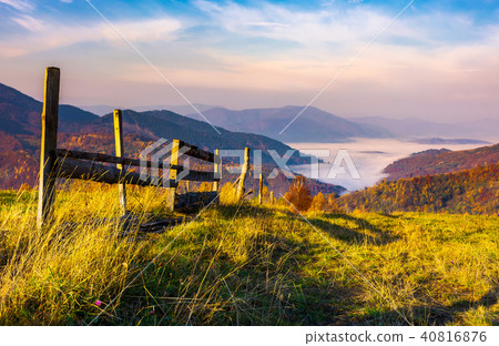beautiful mountainous landscape with wooden fence beautiful mountainous landscape with wooden fence 40816876