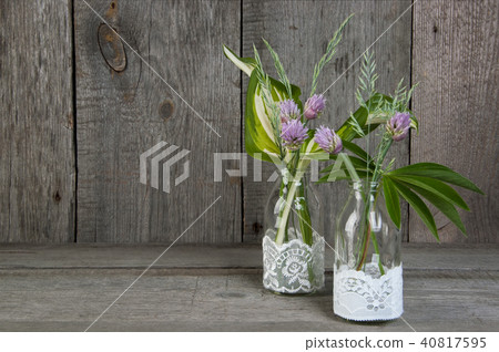 Garden flowers on wooden background. Garden flowers on wooden background. 40817595