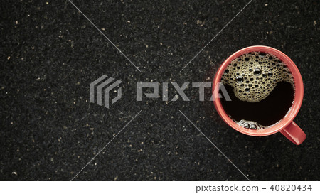 Cup of coffee on granite table 40820434