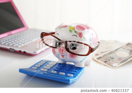 Banknote and calculator 40821337
