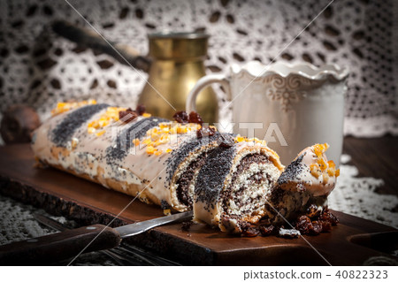 Pieces of poppy seed cake on a plate. 40822323
