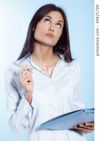Young businesswoman on a white background Young businesswoman on a white background 40825789